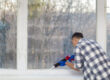 man putting silicon seal