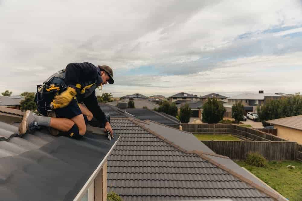 professional gutter guard installation preventing clogs and improving water drainage