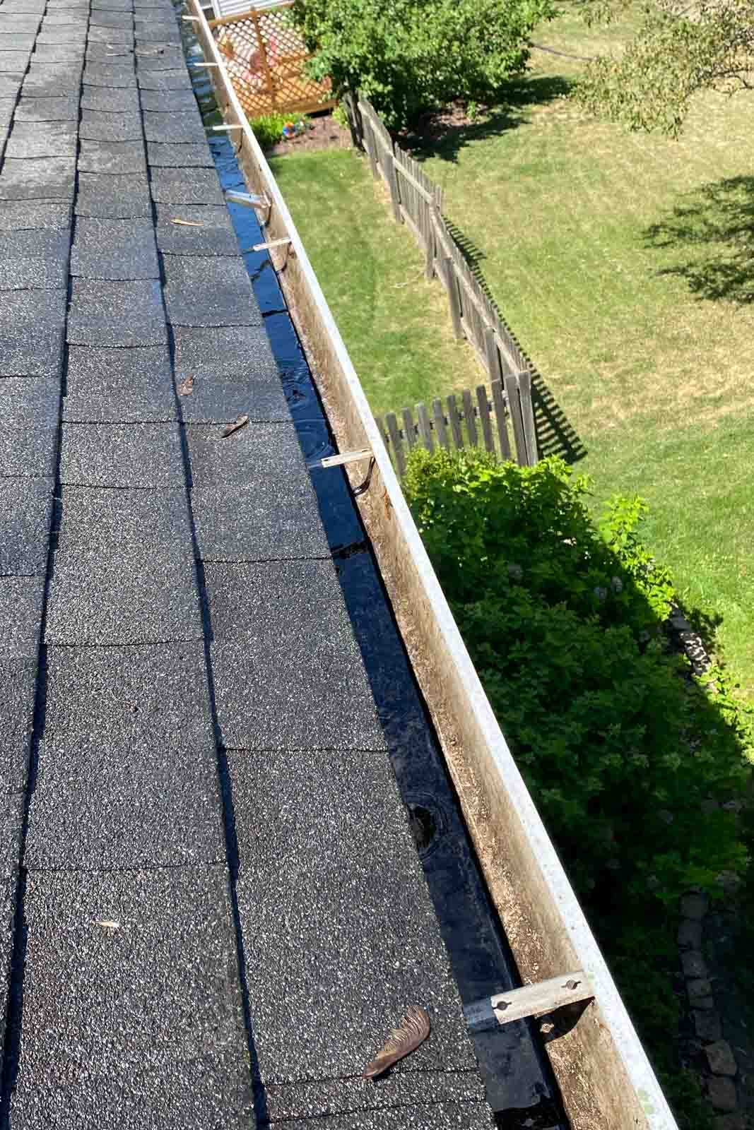 gutter cleaning Hinsdale Naperville IL clogged gutter before cleaning