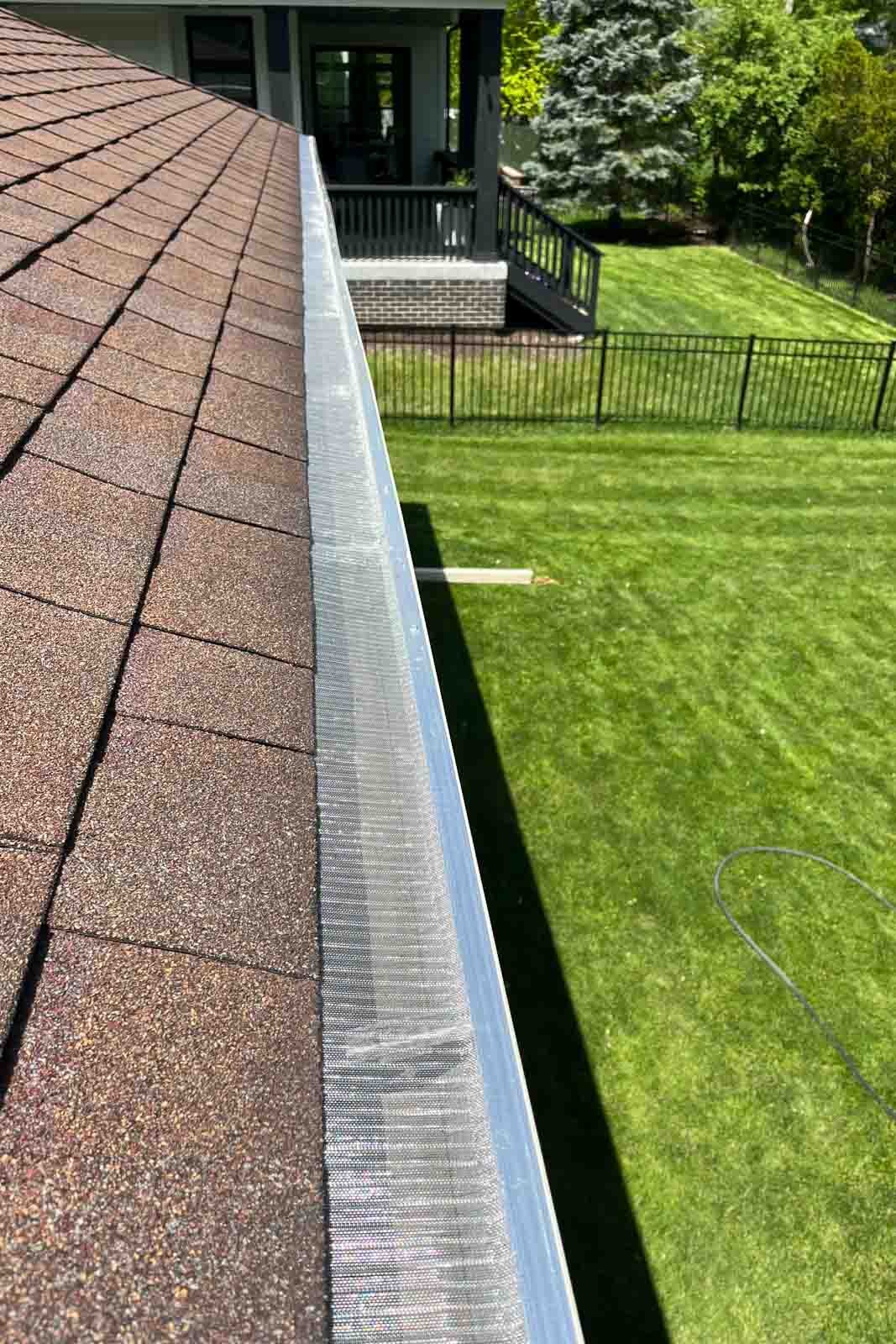 gutter guard Wheaton Westmont IL asphalt shingles installation