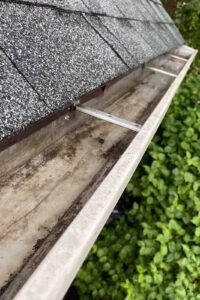 gutter cleaning Lisle Wheaton IL remove buildup debris gutter