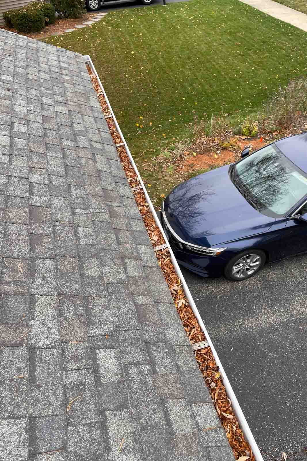 gutter cleaning Naperville Aurora IL roof edge debris removal