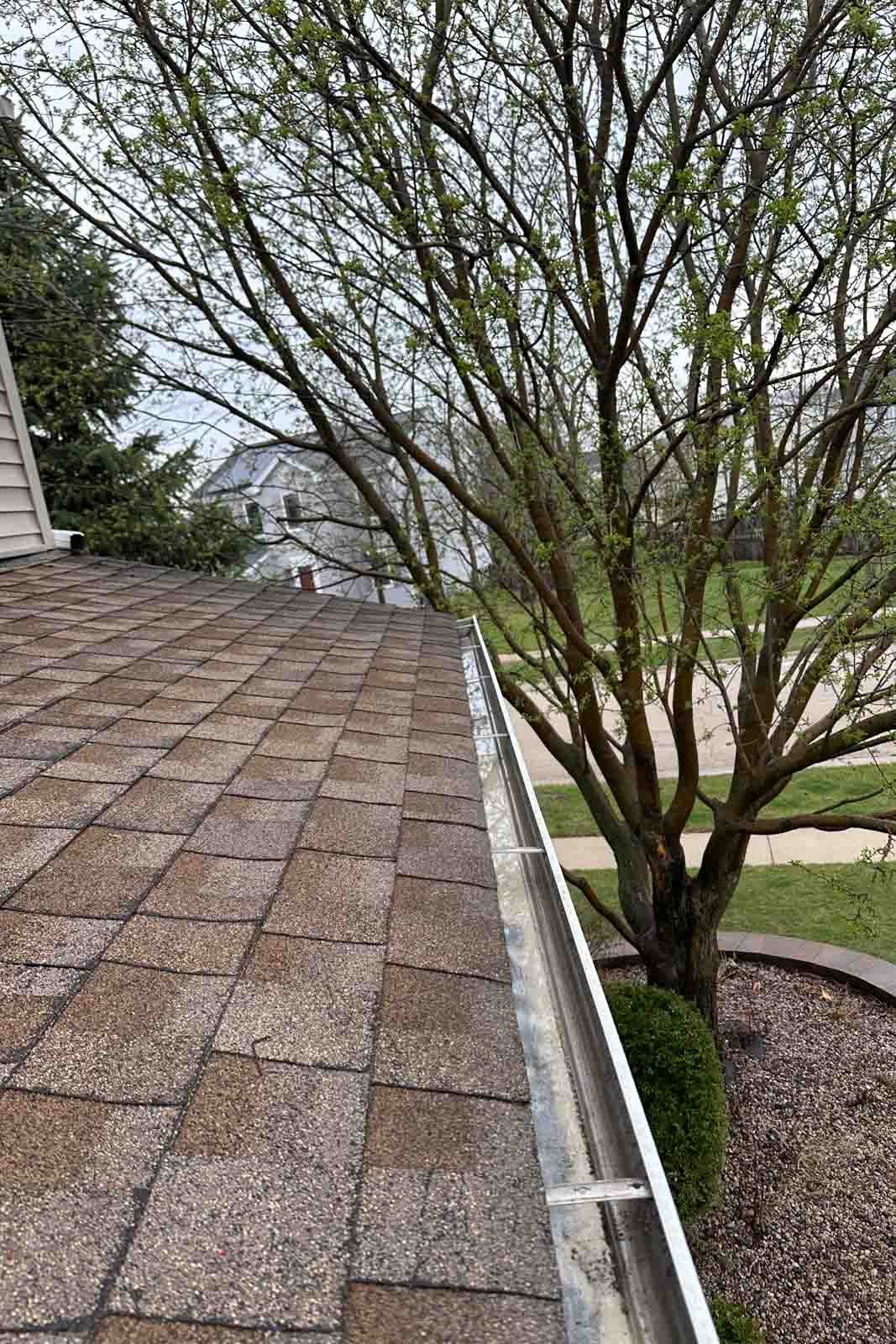 gutter cleaning Wheaton Westmont IL long roof gutter cleaning service