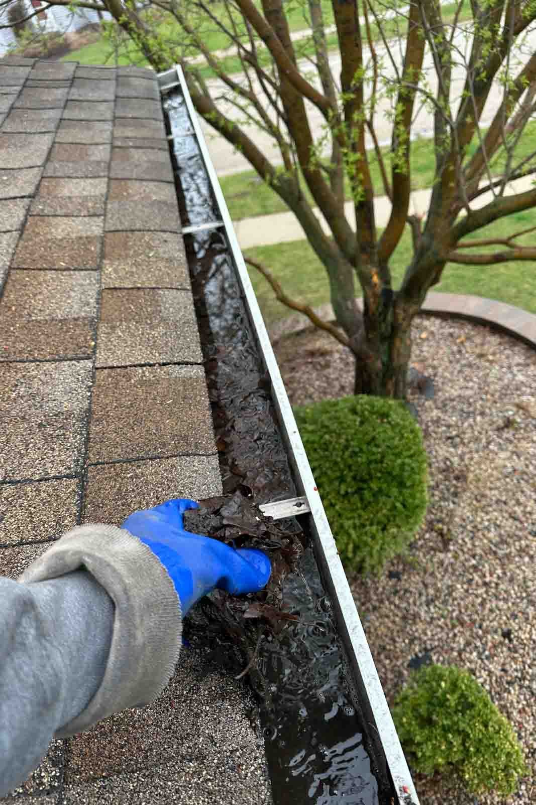 gutter cleaning Lisle Wheaton IL hand removal leaves dirt debris